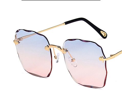 Clearance Sale  sunglasses with a box New frameless cut edge square sunglasses female Korean network red round face slimming anti-UV