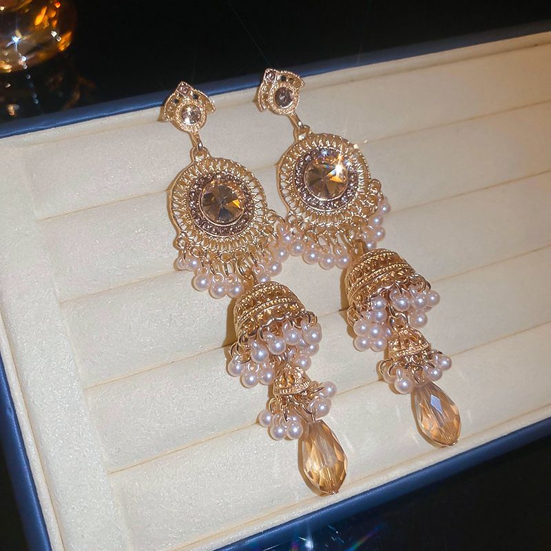 Vintage high-end silver needle women's diamond inlaid flower earrings with exaggerated European and American temperament earrings, light luxury niche accessories