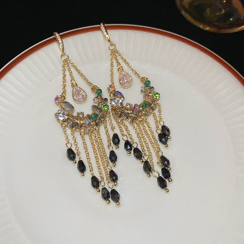 Vintage high-end silver needle ethnic style diamond inlaid flower earrings with exaggerated European and American temperament earrings pendant light luxury niche earrings