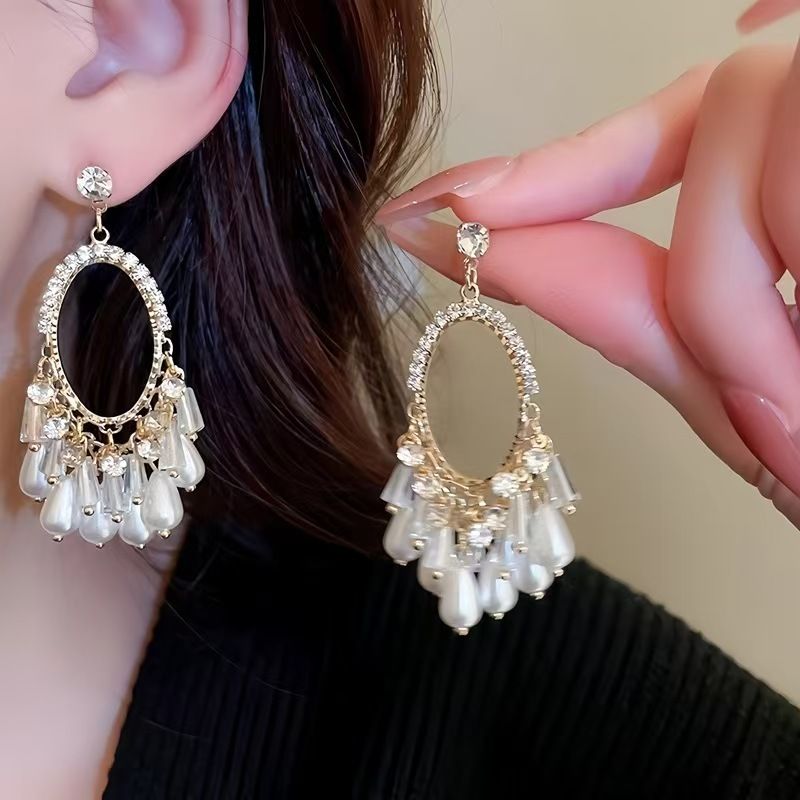 Vintage high-end silver needle ethnic style diamond inlaid flower earrings with exaggerated European and American temperament earrings pendant light luxury niche earrings