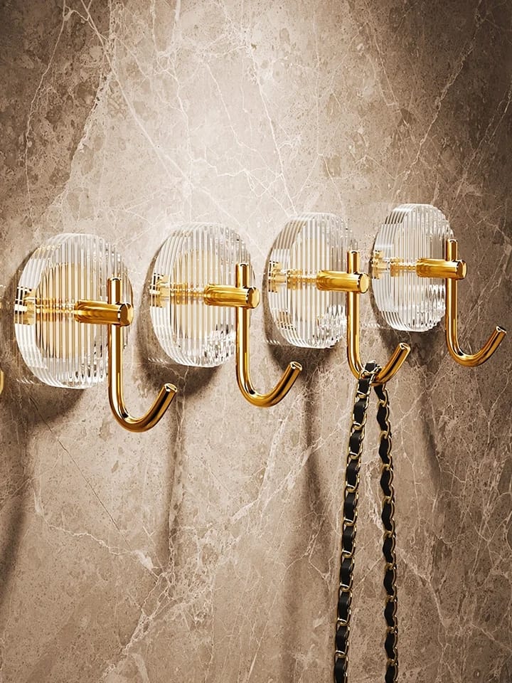4 piece Luxury wall hooks. Crafted with premium high transparency acrylic material, it allows light to create beautiful reflections and refractions, adding a touch of sophistication to your cabinet