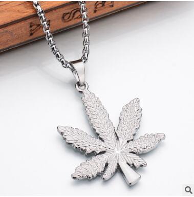 Gold and silver black maple leaf necklace Men and women with the same fashion jewelry hemp leaf pendant XL-302
