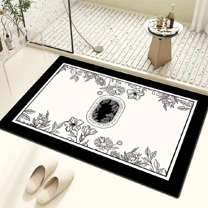 Elegant monochrome entrance mat with ornate central pattern. Made for absorbing moisture and dirt. Ideal for enhancing home decor while keeping floors clean. Suitable for various interior styles, prov
