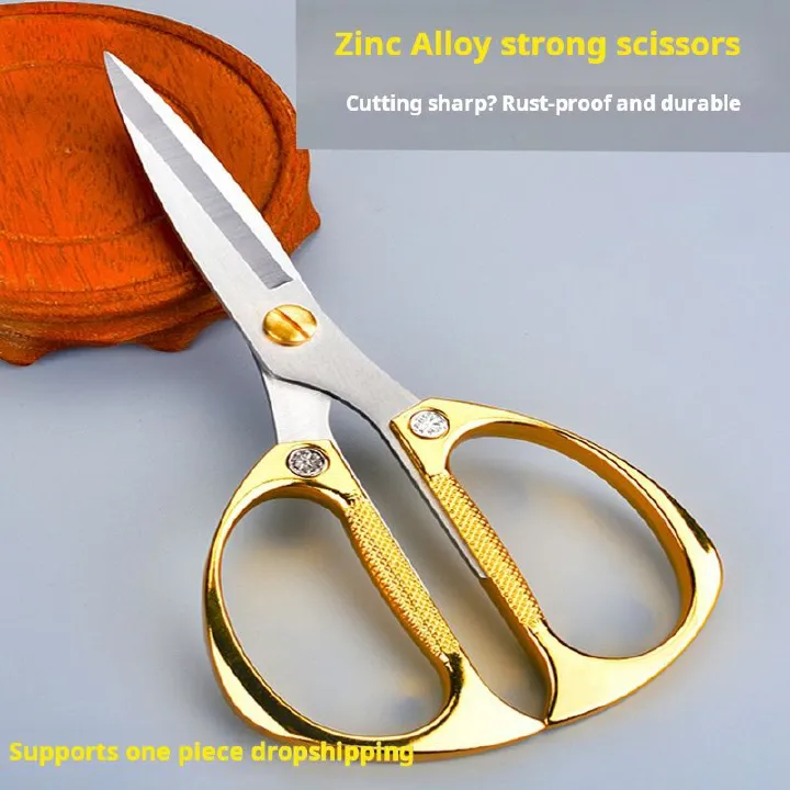 Multifunctional kitchen scissors; Ergonomic design; Sharp blades; Ideal for kitchen tasks like cutting chicken, vegetables, and herbs; Can also be used to trim food packaging;