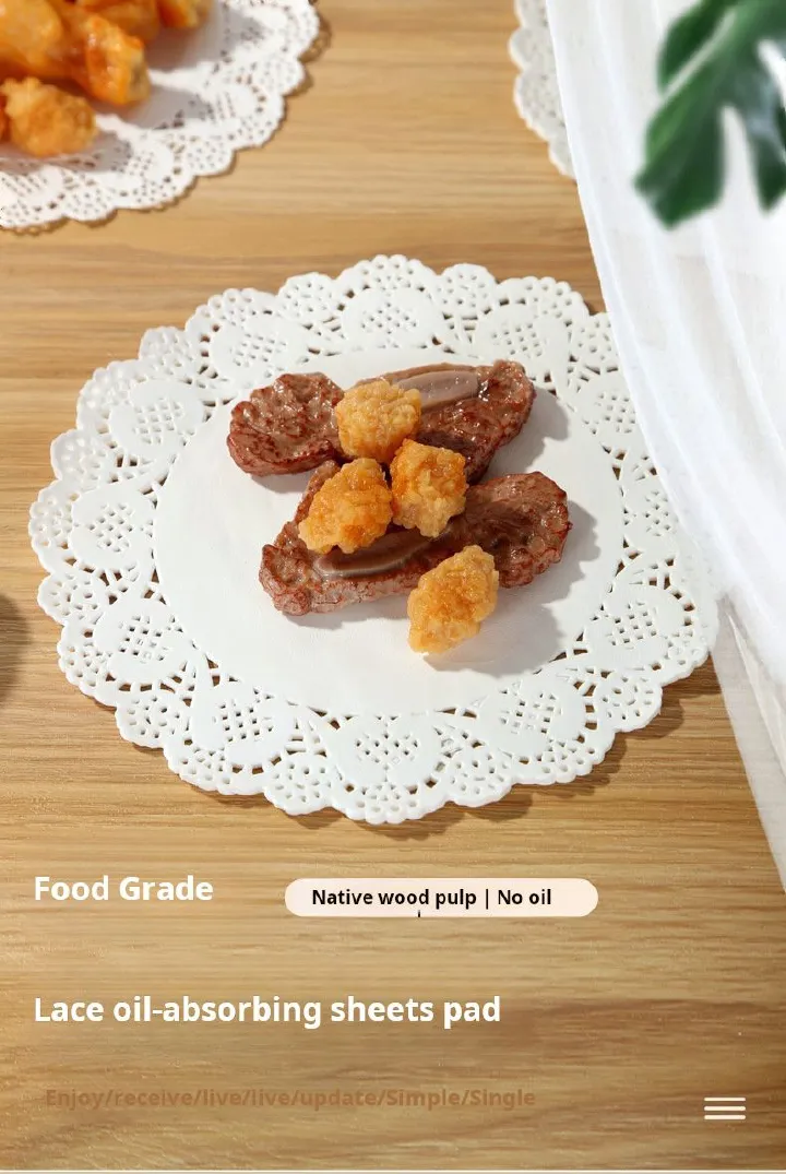paper pad 100pcs/set food - grade lace - edged oil - absorbing paper pad. It's mainly used in the kitchen, especially when frying food, baking pastries, cakes and other food .