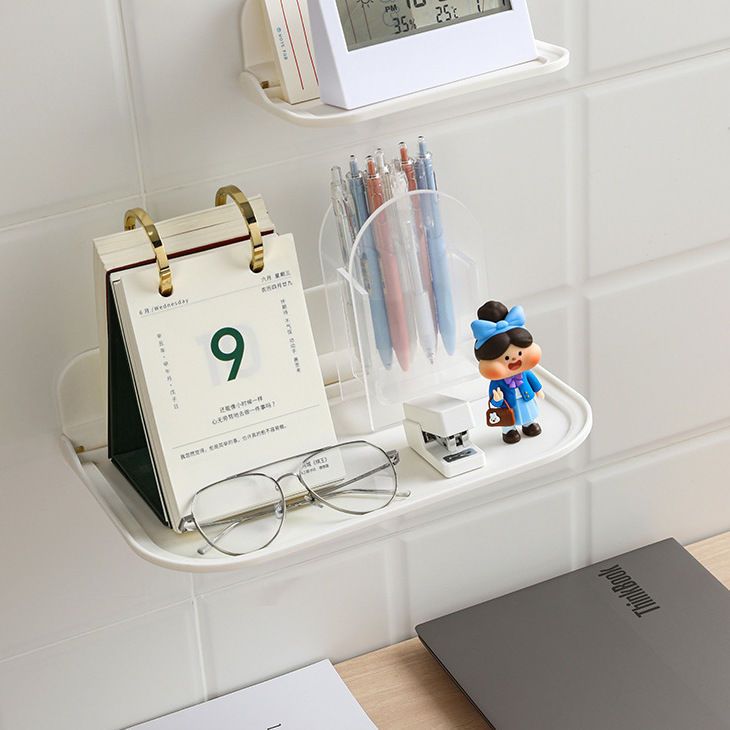 White storage shelf, punch - free installation. Can hold small items. Suitable for kitchens, bathrooms and other scenarios. Simple style.