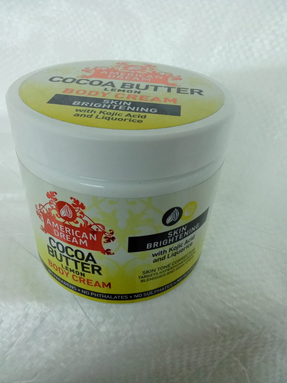 American dream cocoa butter Lemon body cream with Kojic acid &liquorice a brightening formula that helps reduce the  appearance of hyperpigmentation,blemishes,age spots and stretch marks for dry skin.