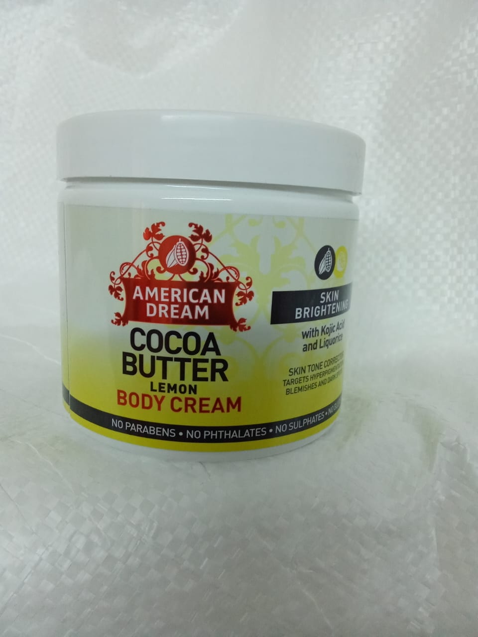 American dream cocoa butter Lemon body cream with Kojic acid &liquorice a brightening formula that helps reduce the  appearance of hyperpigmentation,blemishes,age spots and stretch marks for dry skin.