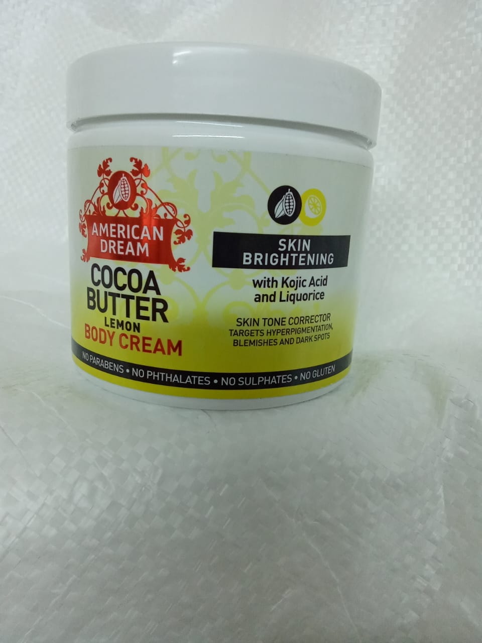 American dream cocoa butter Lemon body cream with Kojic acid &liquorice a brightening formula that helps reduce the  appearance of hyperpigmentation,blemishes,age spots and stretch marks for dry skin.