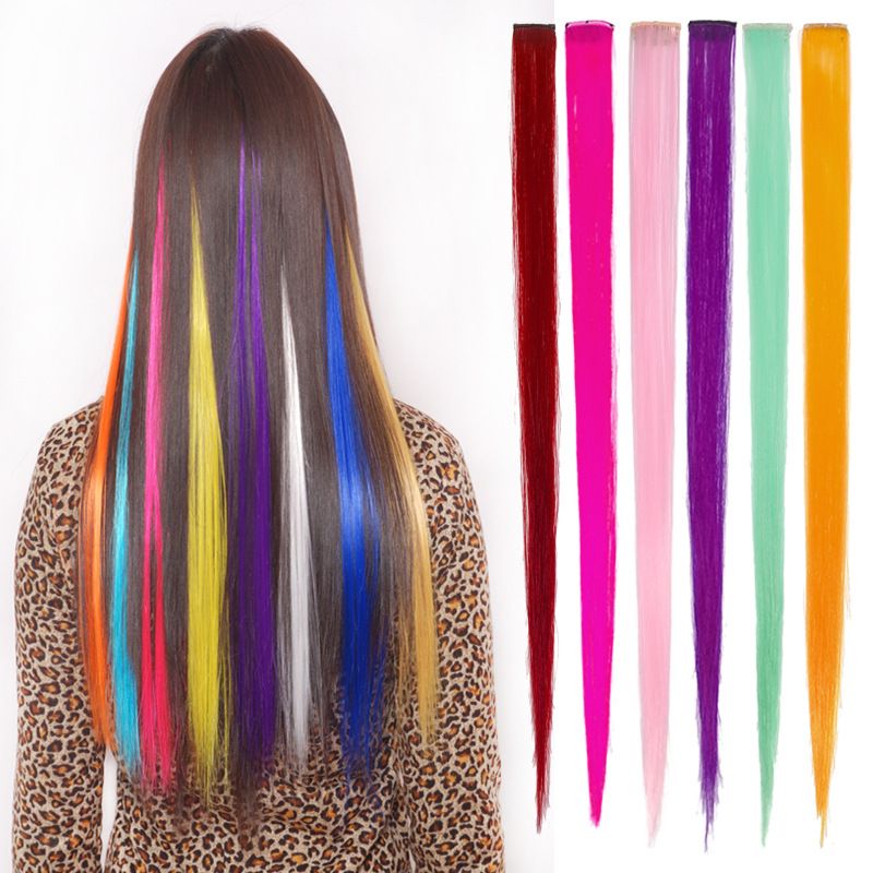 Fashionable colored hair extensions that can be permed, rolled, cut, hung on the ears, dyed in color. One-piece straight hair extensions available in 30 colors