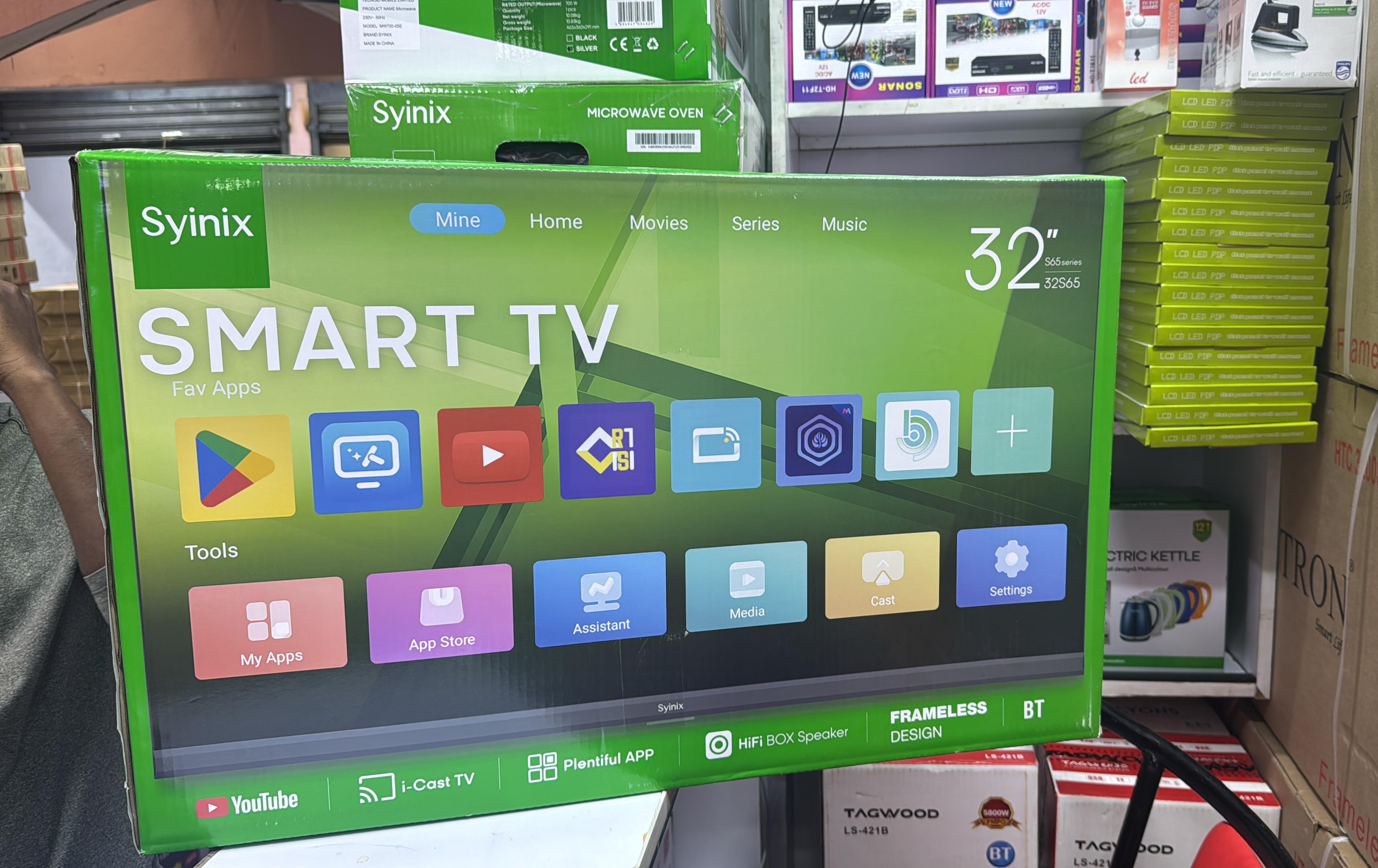 🎁 FREE GIFT SET: MK TV Guard ⚡ + Wall Mount Bracket 🧱 + 3-Way Extension Cable 🔌 – Comes with Syinix 32” Frameless Smart Android TV 📺💚