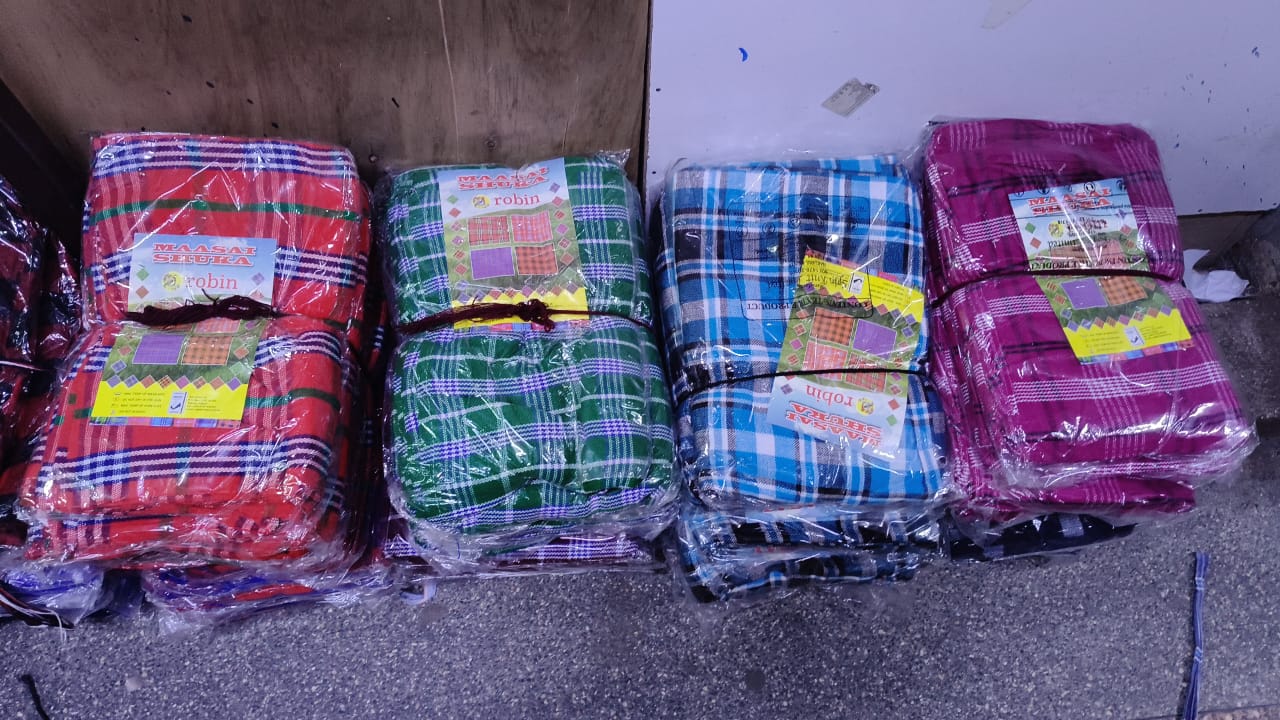 MAASAI SHUKA. African Maasai Shuka throw blanket Masai blanket shuka kikoi blanket, covering your legs/thighs while in the office or at home with guests around, used as a blanket when camping.