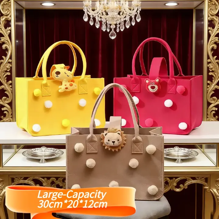 Adorable large-capacity felt tote bags (3 colors) with pom-poms & animal charms. Spacious, lightweight & stylish—perfect for Kenyan young ladies’ daily outings, shopping or casual use