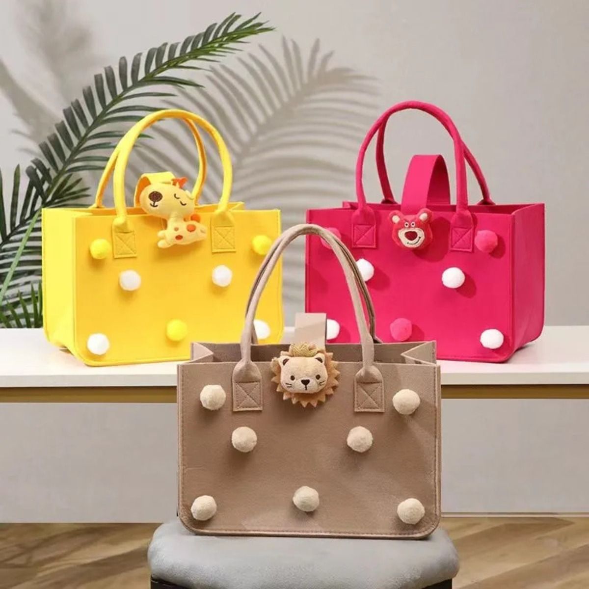 Adorable large-capacity felt tote bags (3 colors) with pom-poms & animal charms. Spacious, lightweight & stylish—perfect for Kenyan young ladies’ daily outings, shopping or casual use