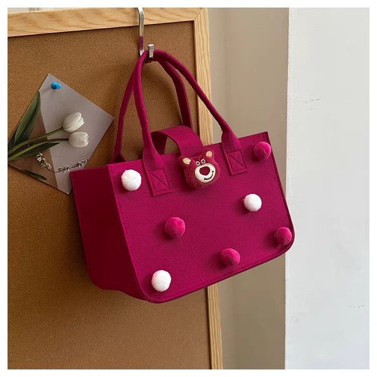Adorable large-capacity felt tote bags (3 colors) with pom-poms & animal charms. Spacious, lightweight & stylish—perfect for Kenyan young ladies’ daily outings, shopping or casual use