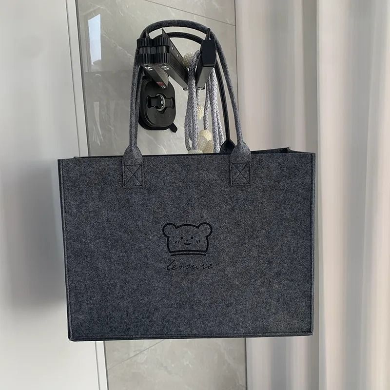 Stylish gray large-capacity felt tote bag with cute bear embroidery. Spacious, lightweight & durable—perfect for Kenyan young ladies’daily shopping, work or casual outings