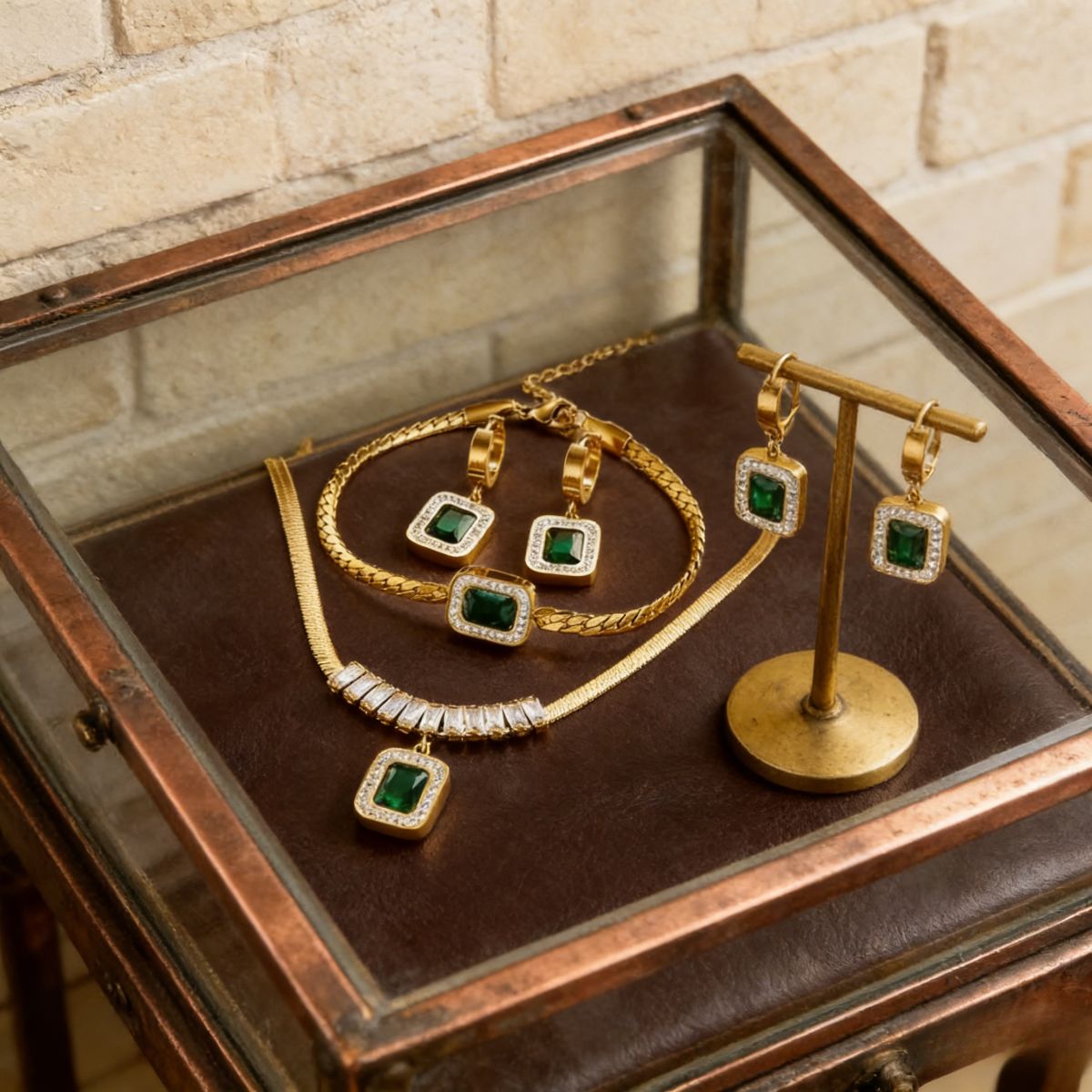 Elegant gold-plated jewelry set (necklace, bracelet, earrings) with green gem & crystal details. Stylish, shiny & versatile—perfect for Kenyan young ladies’ parties。