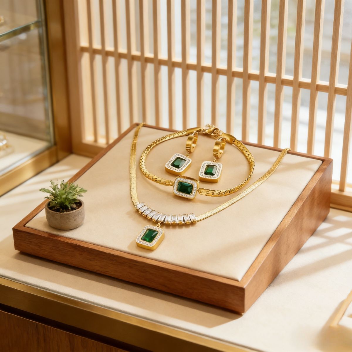 Elegant gold-plated jewelry set (necklace, bracelet, earrings) with green gem & crystal details. Stylish, shiny & versatile—perfect for Kenyan young ladies’ parties。