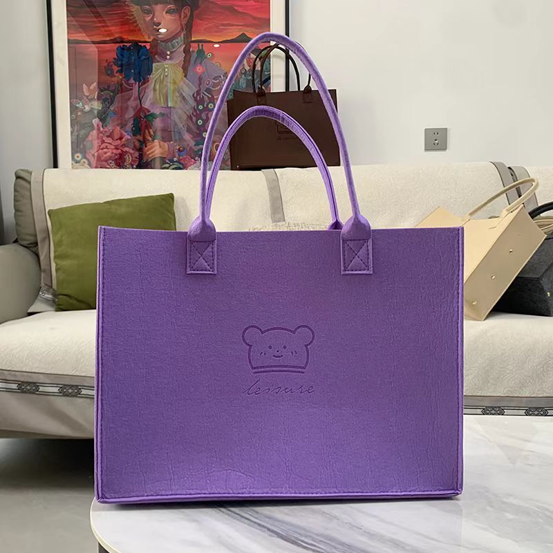 Stylish gray large-capacity felt tote bag with cute bear embroidery. Spacious, lightweight & durable—perfect for Kenyan young ladies’daily shopping, work or casual outings