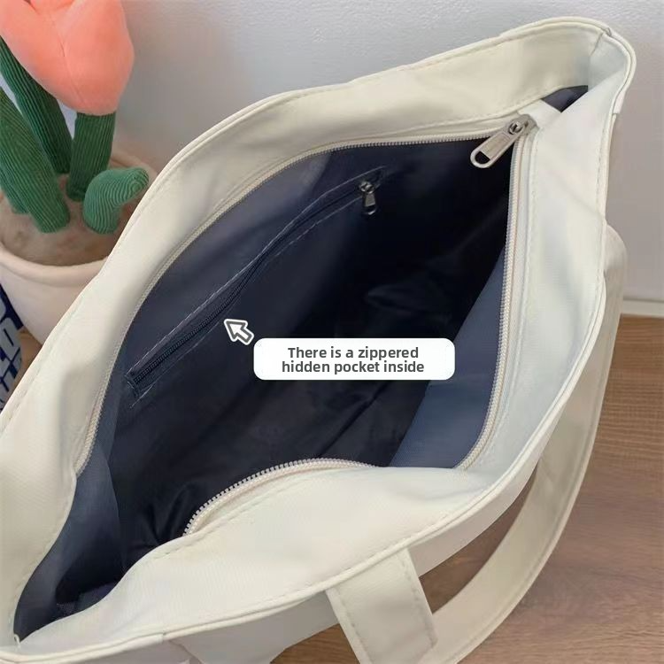 Trendy large-capacity white tote bag: "DISK IT" print, multi-pockets. Spacious, lightweight & practical—perfect for Kenyan young ladies’ daily outings/shopping.