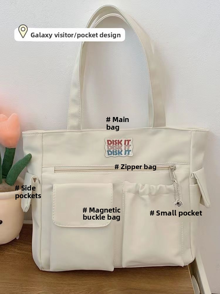 Trendy large-capacity white tote bag: "DISK IT" print, multi-pockets. Spacious, lightweight & practical—perfect for Kenyan young ladies’ daily outings/shopping.