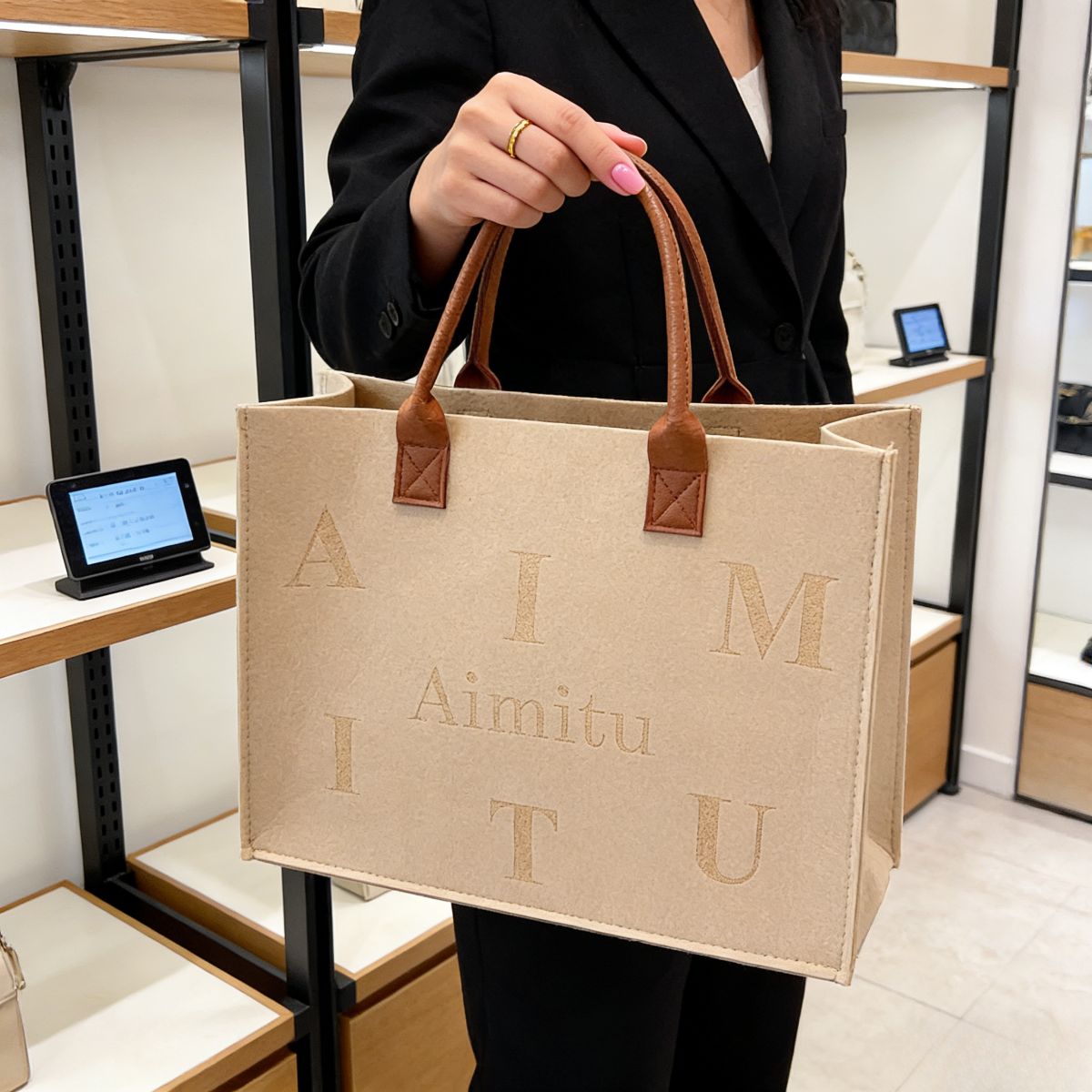 Trendy women’s beige felt tote bag Large-Capacity : "Aimitu" letter print, leather handles. Spacious, stylish & durable—perfect for Kenyan young ladies’ daily outings.