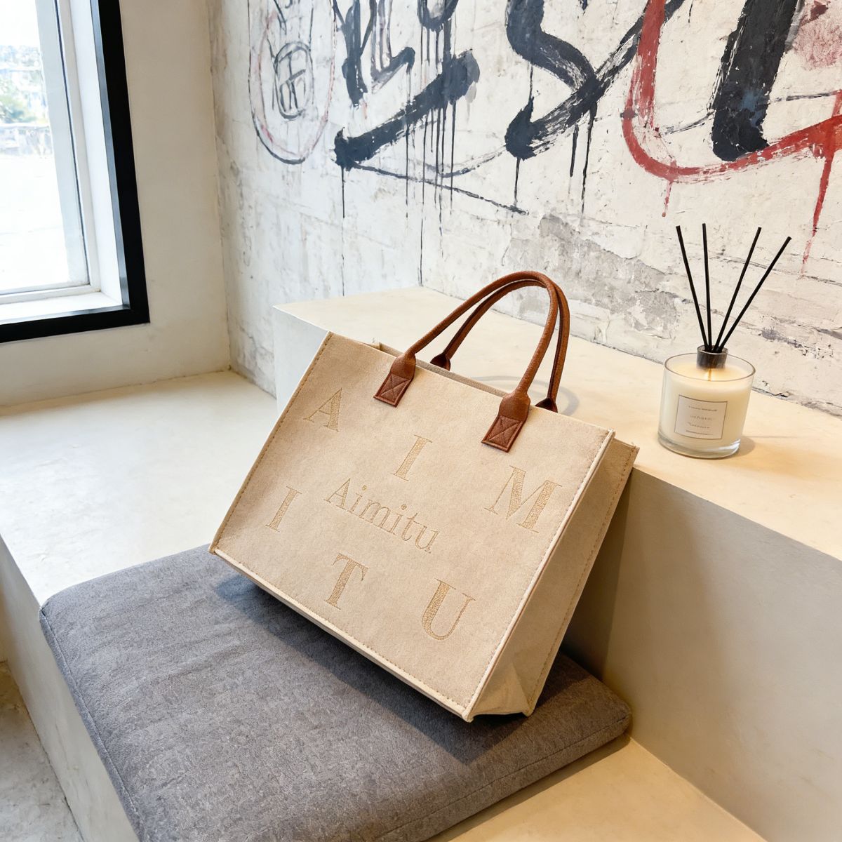 Trendy women’s beige felt tote bag Large-Capacity : "Aimitu" letter print, leather handles. Spacious, stylish & durable—perfect for Kenyan young ladies’ daily outings.