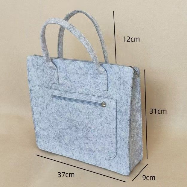 Trendy felt business tote bag: large-capacity for laptops, durable & stylish. Ideal for Kenyan young professionals’ work, commutes or business meetings.