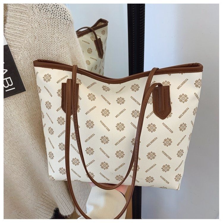 Trendy PU leather shoulder bag: stylish patterned design & contrast strap. Ideal for Kenyan young ladies’ daily outings, shopping, dates or casual gatherings.