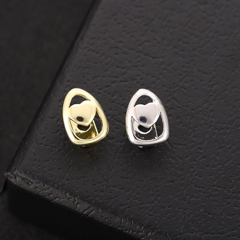 gold teeth silver teeth Charming Heart Accent Grillz for Fashion Enthusiasts