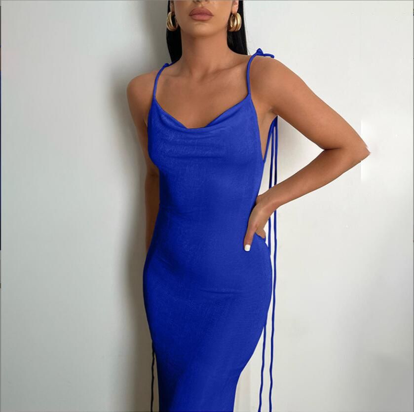 New stylish and sexy backless dress with a halter neck and tie-up details, exuding an elegant temperament. This long dress is suitable for parties and evening banquets in the summer of 2025.