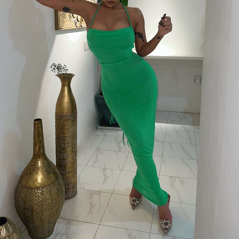 New stylish and sexy backless dress with a halter neck and tie-up details, exuding an elegant temperament. This long dress is suitable for parties and evening banquets in the summer of 2025.