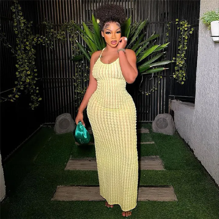 Summer new women's fashion elegant temperament solid color backless sleeveless sling slim long dress suitable for leisure and holiday commuting party.