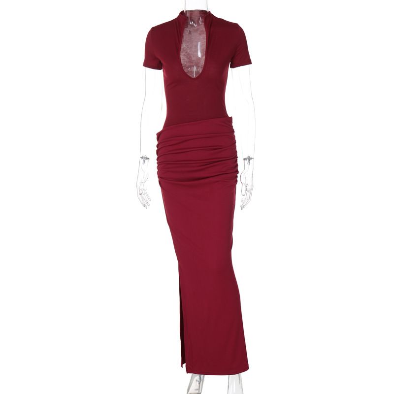 New elegant and sexy long dress for guests at evening banquets in the summer of 2025. It features a deep V-neck, short sleeves, a solid color, a form-fitting silhouette and pleats.
