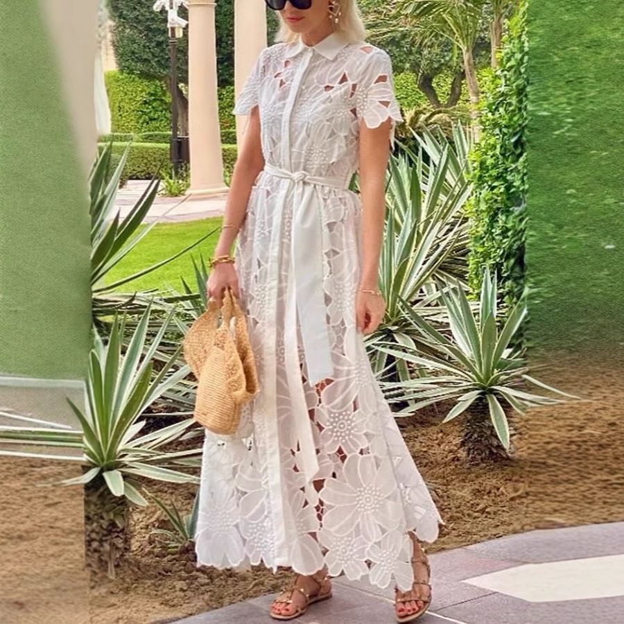 New women's dresses in summer are fashionable and elegant. Lace openwork short-sleeved lapels and single-breasted cardigans are long dresses suitable for daily leisure and holiday commuting.