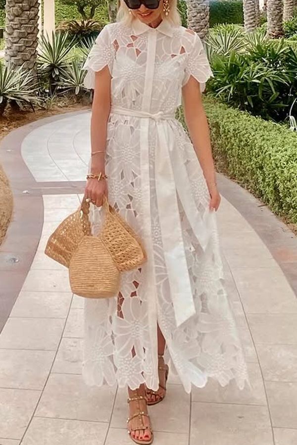 New women's dresses in summer are fashionable and elegant. Lace openwork short-sleeved lapels and single-breasted cardigans are long dresses suitable for daily leisure and holiday commuting.