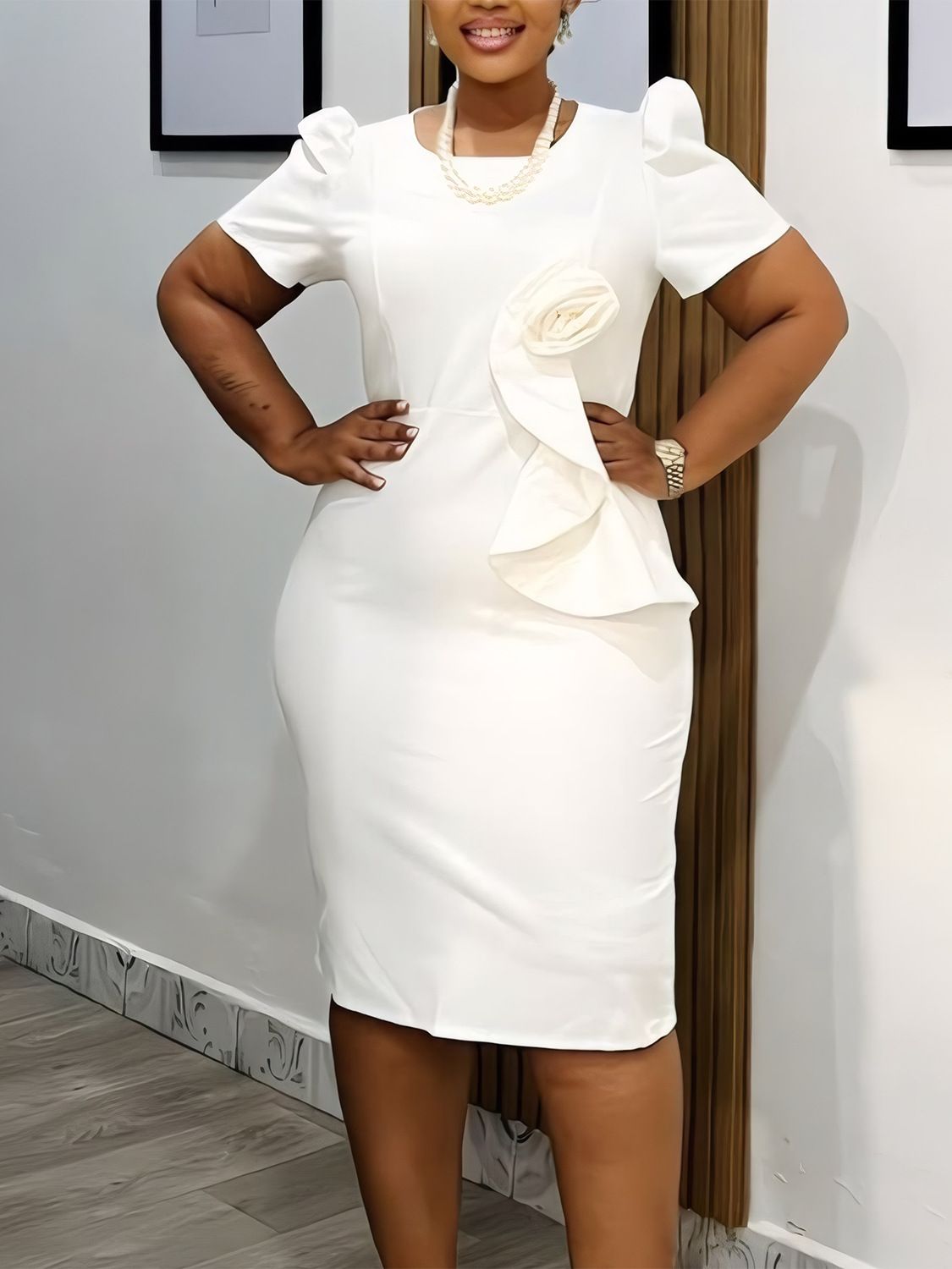 New fashionable and elegant body-hugging pencil-style dress with ruffles, in solid color and short sleeves in 2025