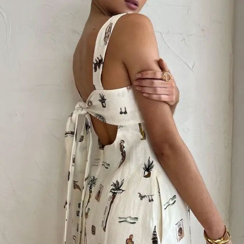 New style for the summer of 2025. It is a fashionable, elegant and casual sleeveless halter dress with printed patterns and a large skirt. It is a long dress suitable for parties and evening banquets.