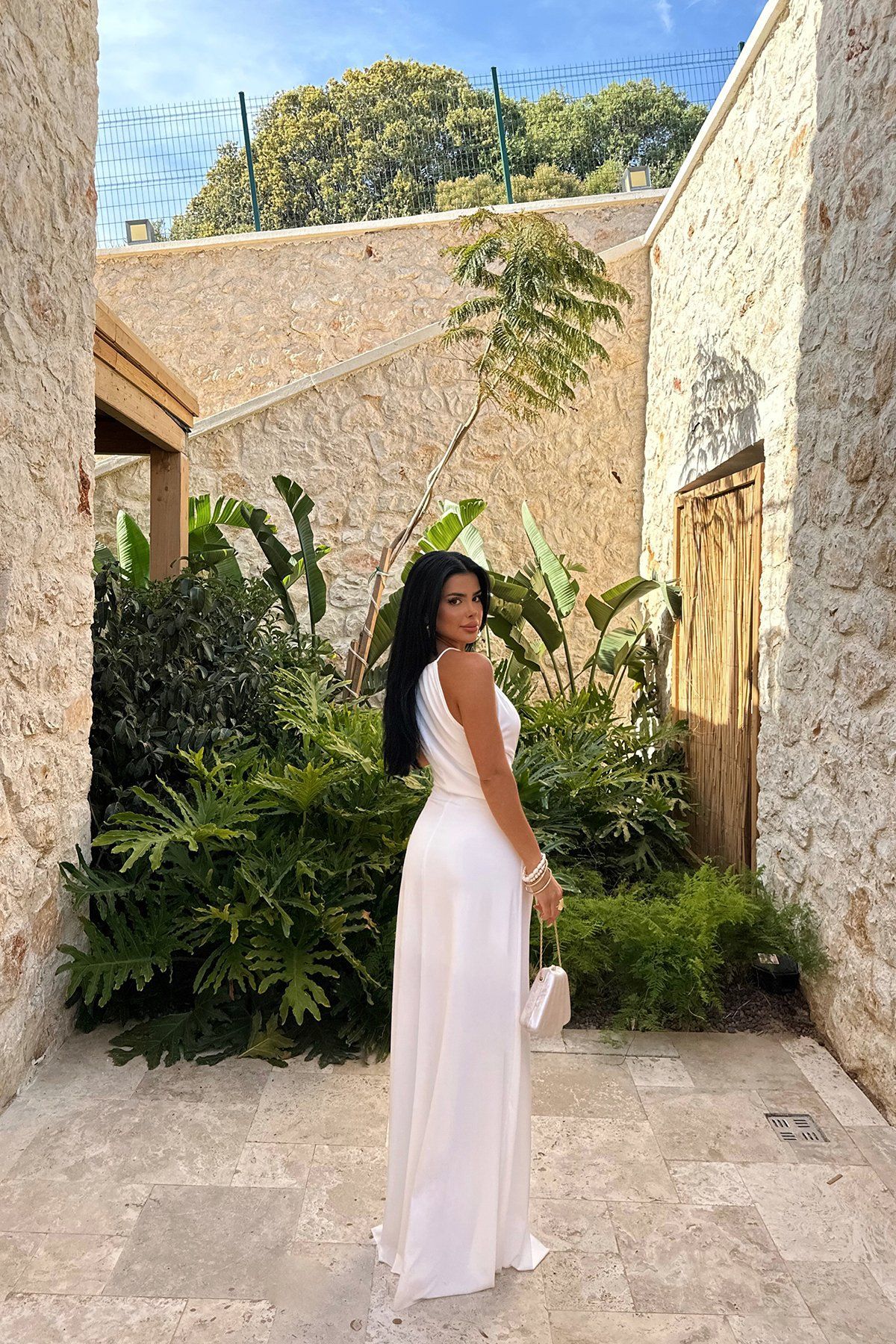 2025 Summer New Women's Fashion: Stylish, elegant and graceful halterneck sleeveless sexy hollow-out pleated slim-fit long dress for parties, evening banquets and guest attendance.