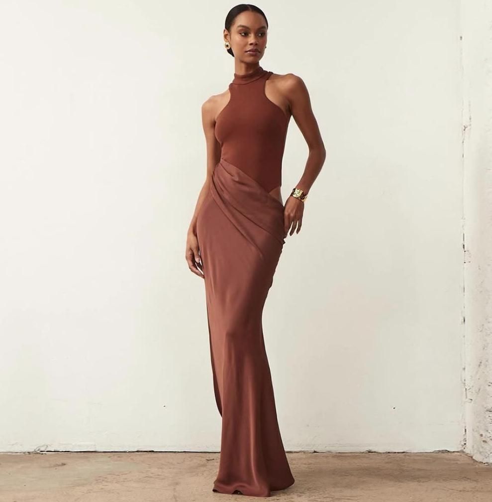 New women's dresses in summer are fashionable and elegant. Solid color round neck sleeveless slim stitching hollow long dresses are suitable for daily leisure commuting dinner guests.