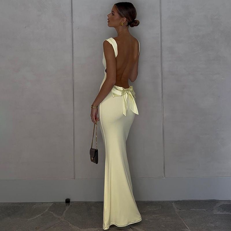 Summer new women's dress fashion elegant temperament solid color sleeveless suspenders halter bow slim long dress suitable for leisure party dinner dress.