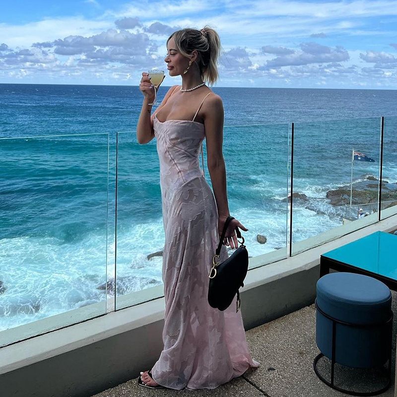 Europe and the United States summer new women's dress fashion solid color perspective sleeveless sling big skirt long dress suitable for leisure holiday party banquet dress.