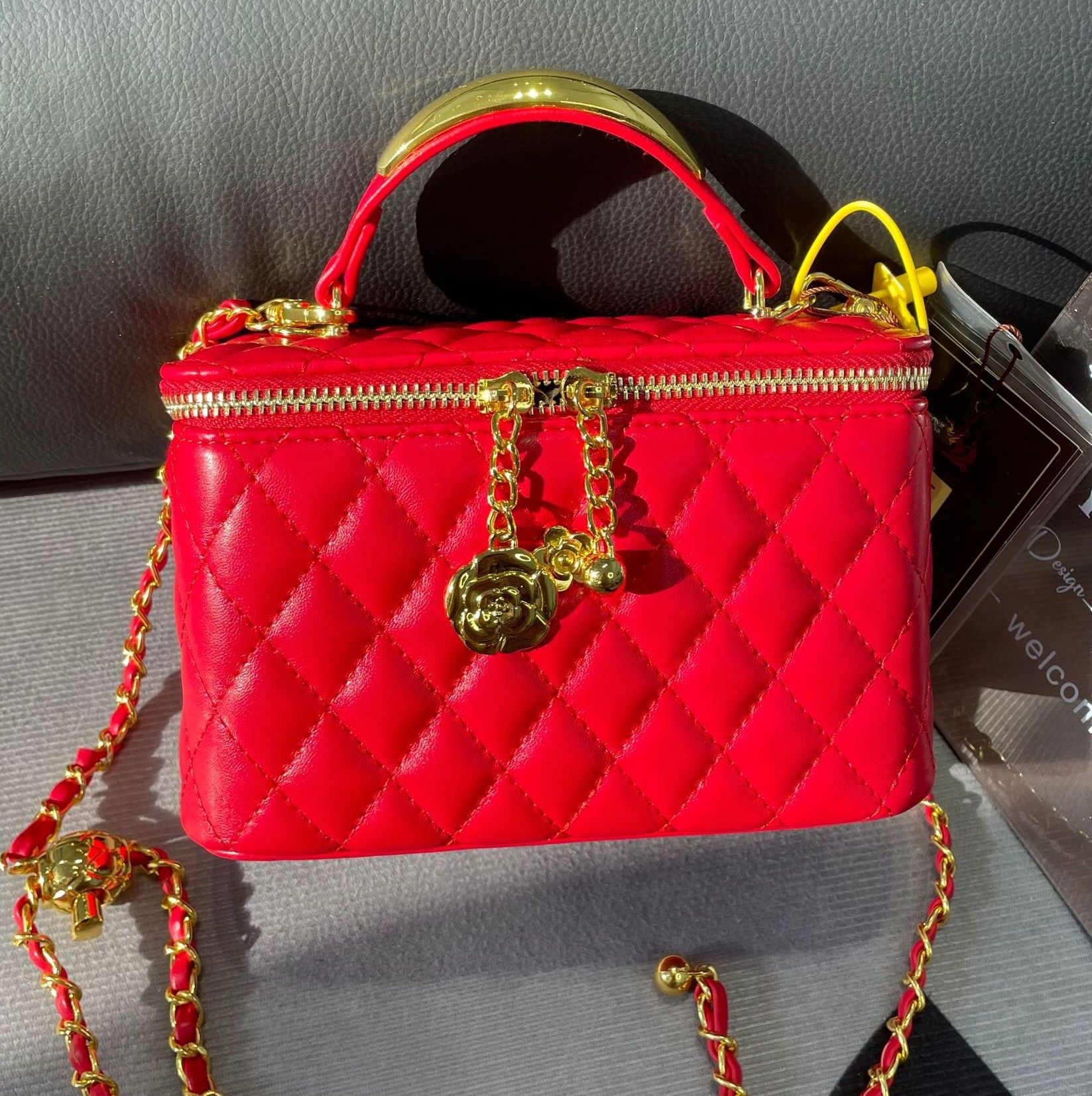 New ladies handbag fashion diamond chain small camellia fragrance portable shoulder crossbody bag suitable for daily leisure commuting parties.