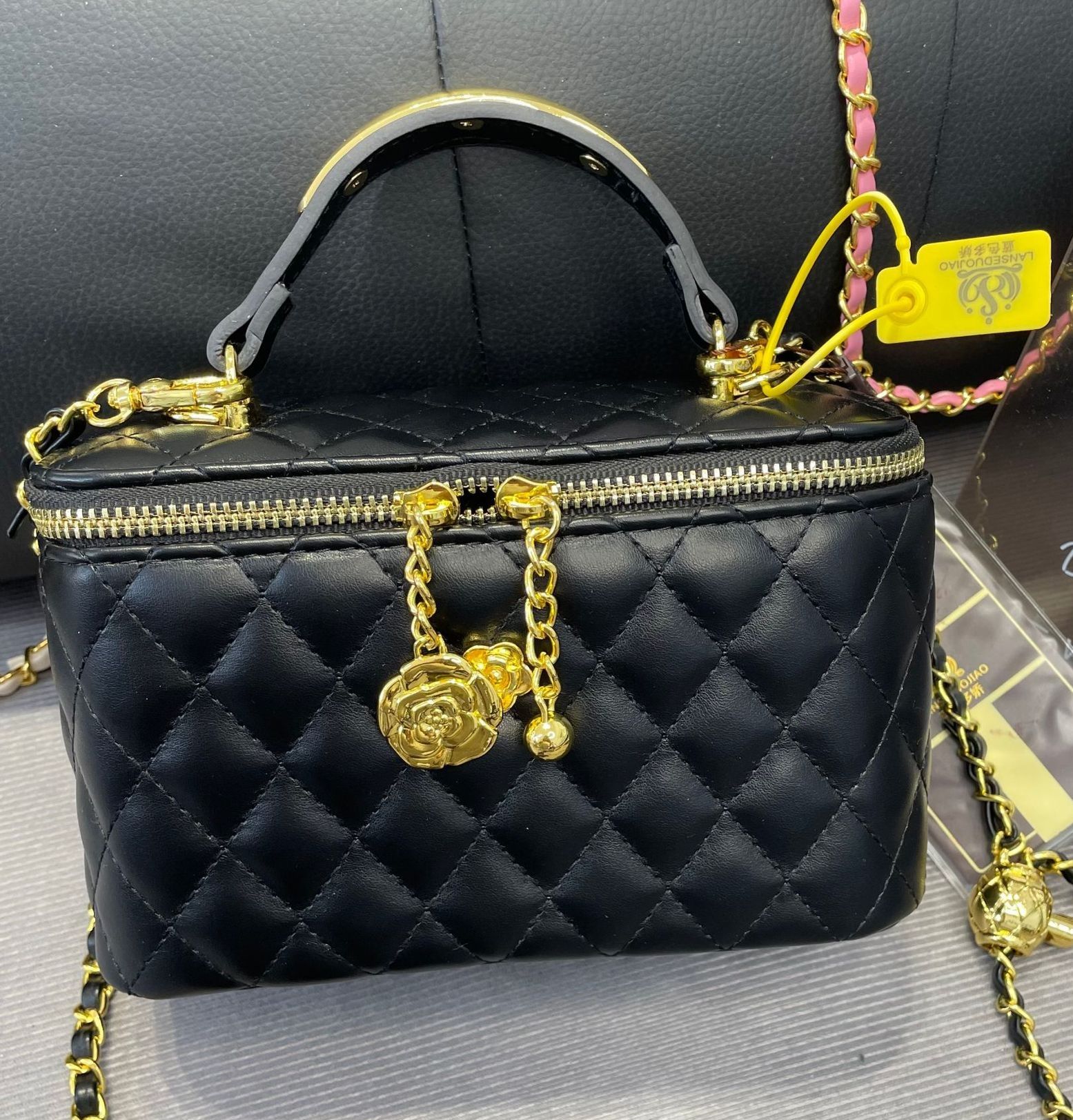 New ladies handbag fashion diamond chain small camellia fragrance portable shoulder crossbody bag suitable for daily leisure commuting parties.