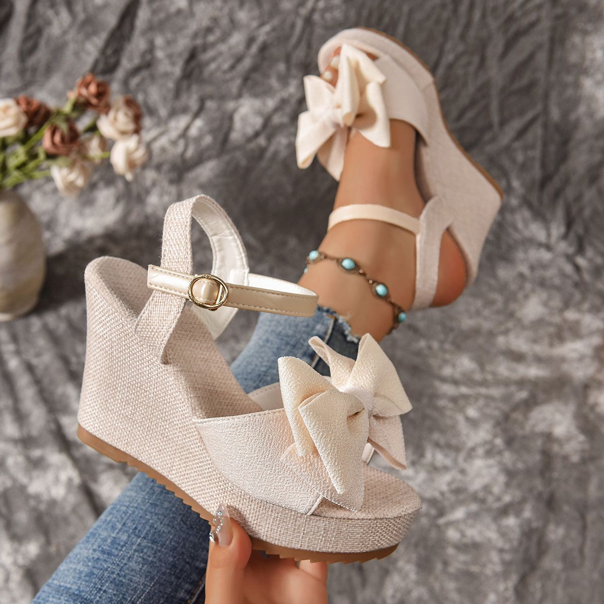New women's shoes in summer with open toe bow wedge sandals with sponge cake bottom and high heels are suitable for daily leisure commuting parties.