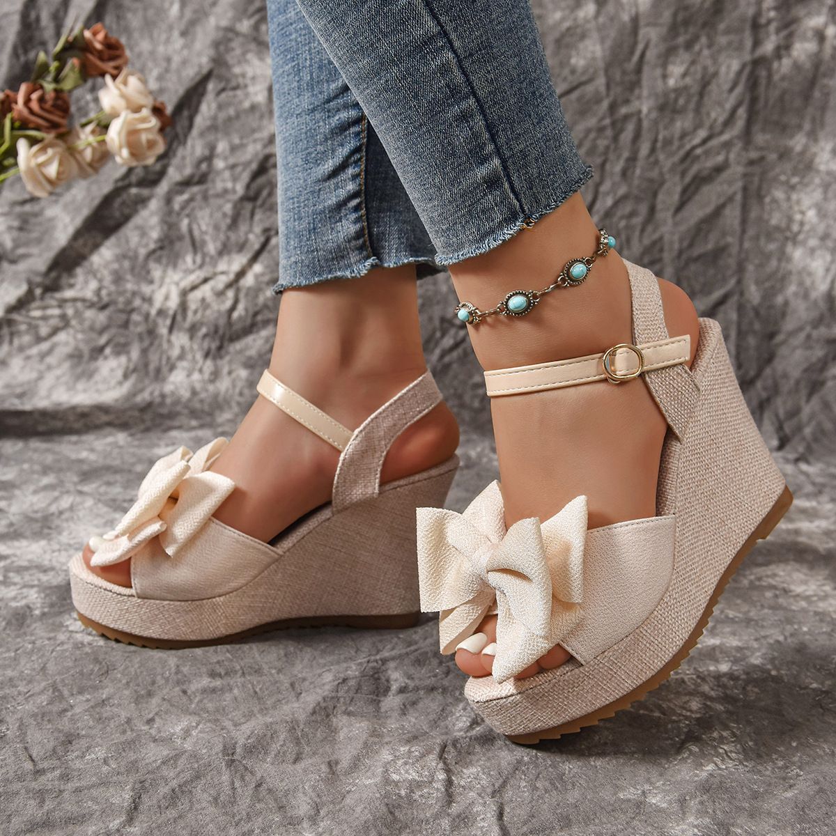 New women's shoes in summer with open toe bow wedge sandals with sponge cake bottom and high heels are suitable for daily leisure commuting parties.