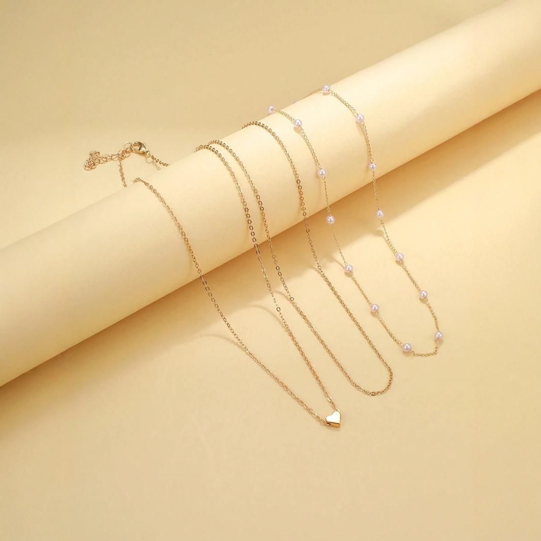 Women's Gold Pearl Multi - Layer Necklace, Dainty Heart Pendant Choker, Delicate Layered Chain Jewelry, Trendy Boho Beachwear Accessory, Ideal Gift for Her
