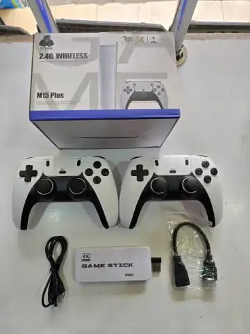 M15 Plus 2.4G Wireless Retro Game Stick console. 
It features 4K HDMI output for high-definition display on modern TVs. 
The package includes two 2.4GHz wireless controllers for multi-player gaming.