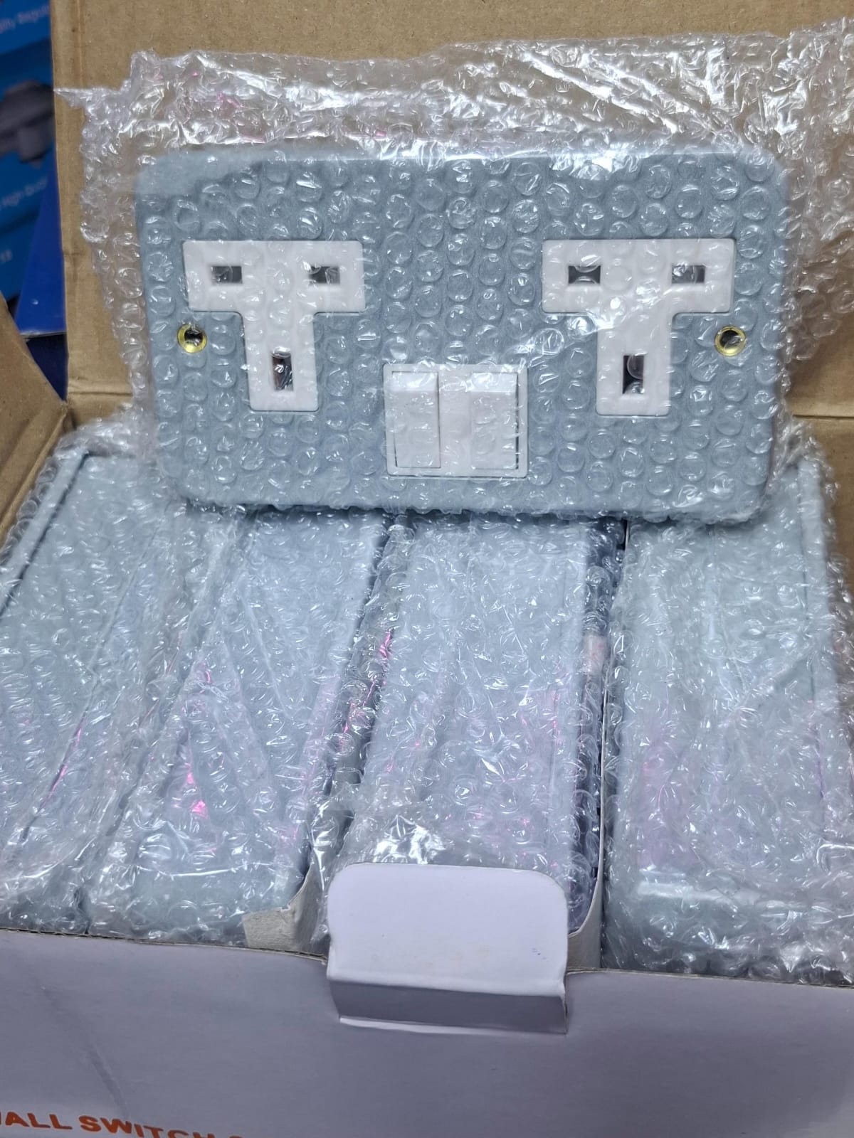 metal-clad 13A twin switched socket. Key specifications include: 
Rating: 13A, 220-250V AC, 50Hz
Max Output: 3000W@230V
Material: Steel box and panel
Safety features: Integrated shutters and