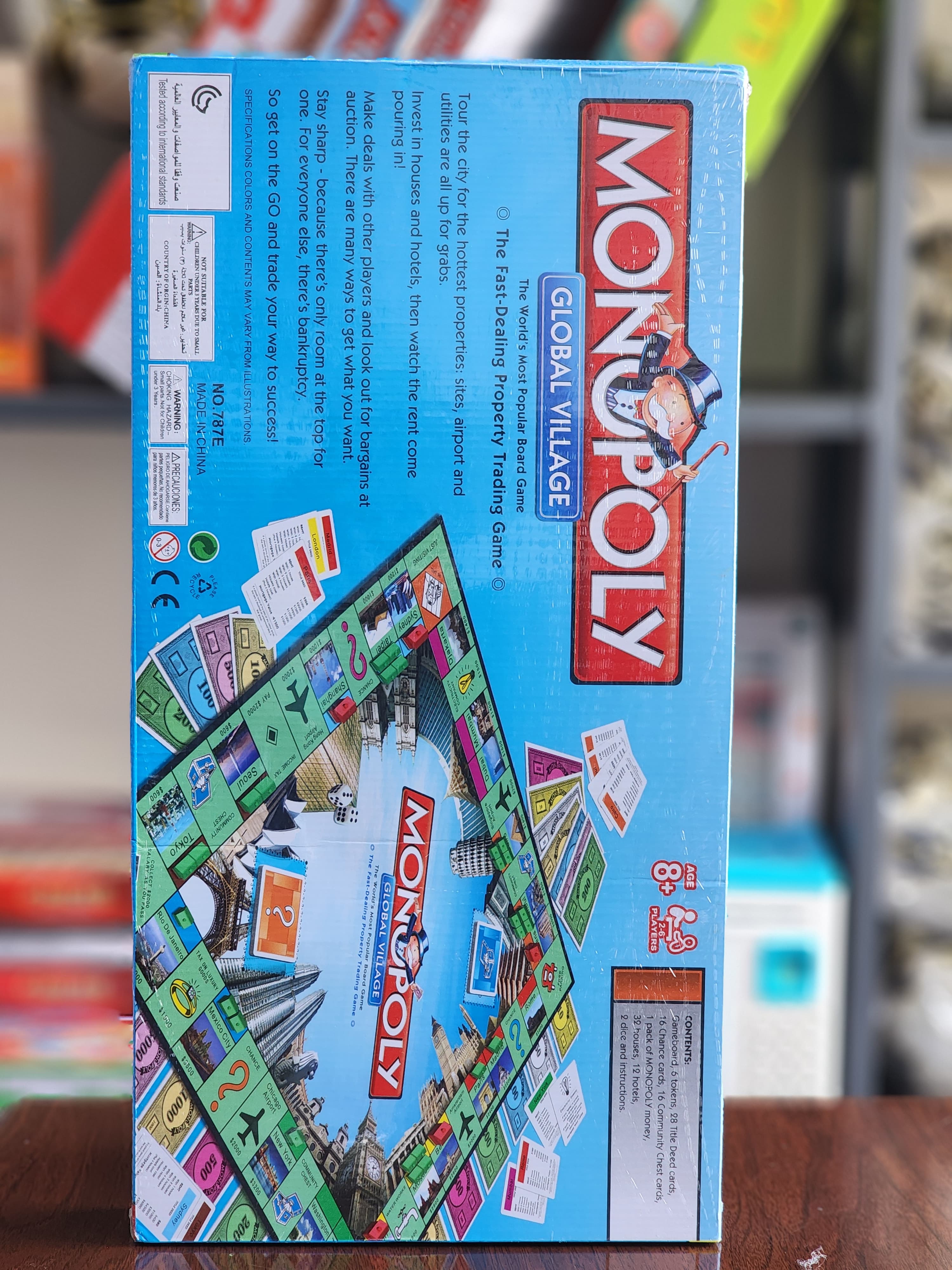 Monopoly Global Village Board Toys & Games Game paper board (foldable) 6 Token 28 Title Deed Cards 16 Chance cards 16 community chest Cards 1 pack of Monopoly money 32 houses 12 hotels large size